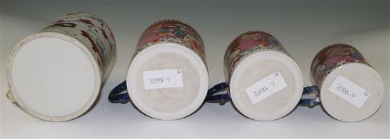 A graduated set of three Chinese export famille rose mugs and another larger, Qianlong period, 10cm-13cm and 16.5cm (4)